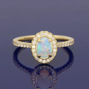 18ct Yellow Gold Oval Opal and Diamond Halo Ring