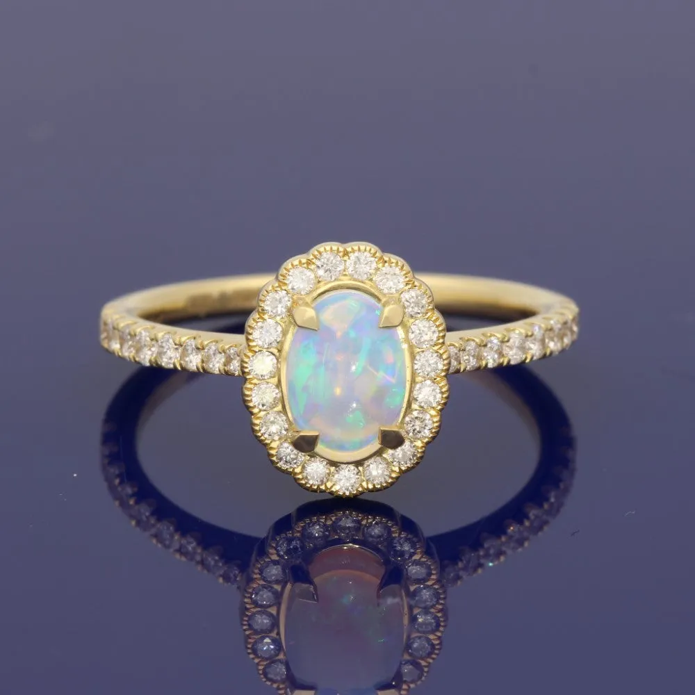 18ct Yellow Gold Oval Opal and Diamond Halo Ring