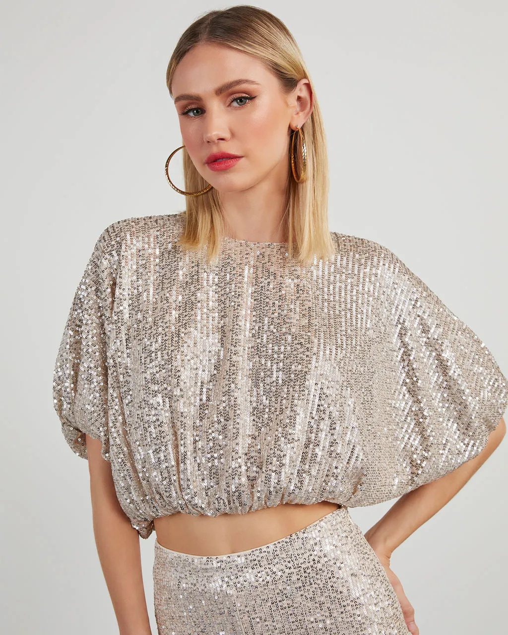 Diva Sequin Bubble Hem Top